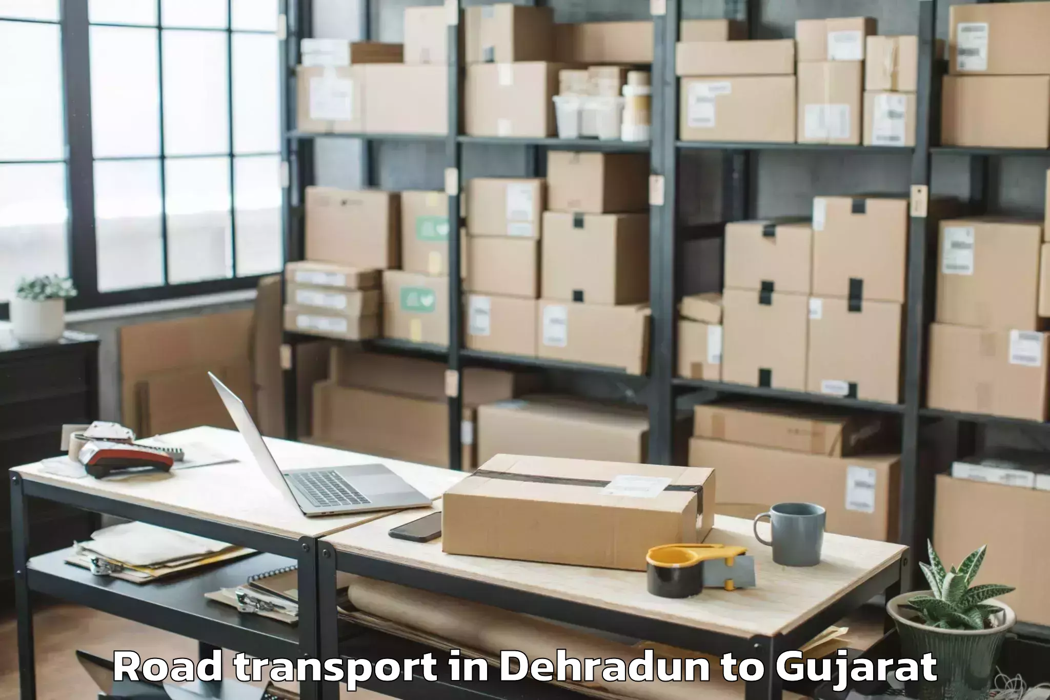 Top Dehradun to Dehgam Road Transport Available